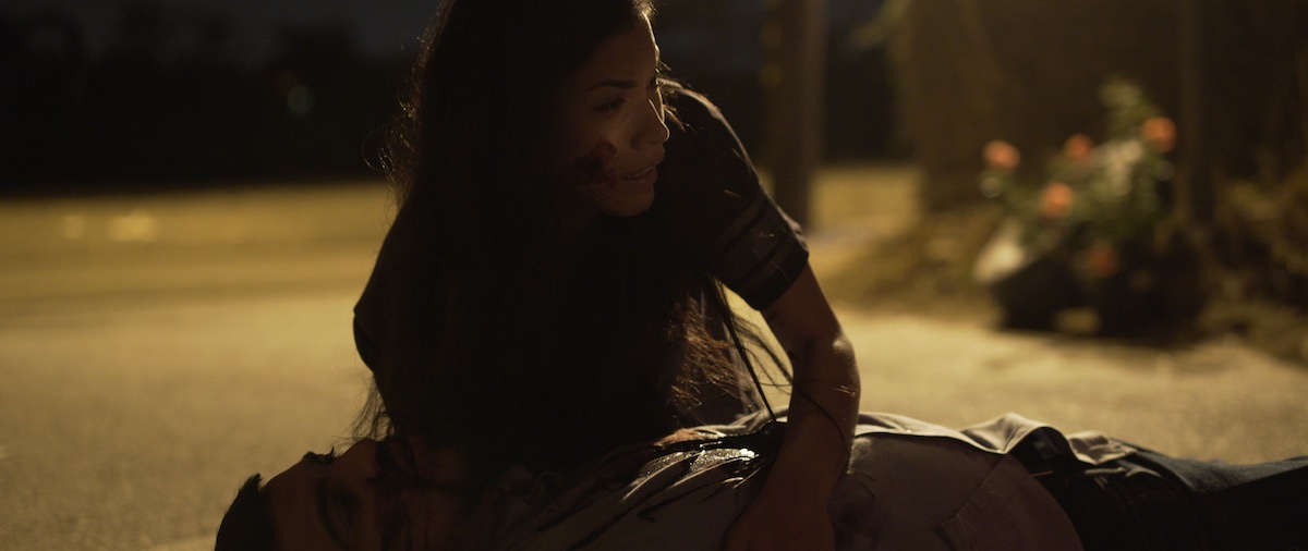 Character lit by warm dusk light outdoors in Avenge the Crows